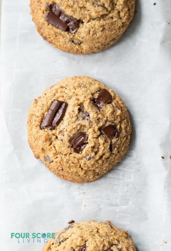 a close up of a Keto Chocolate Chip cookie on a baking sheet