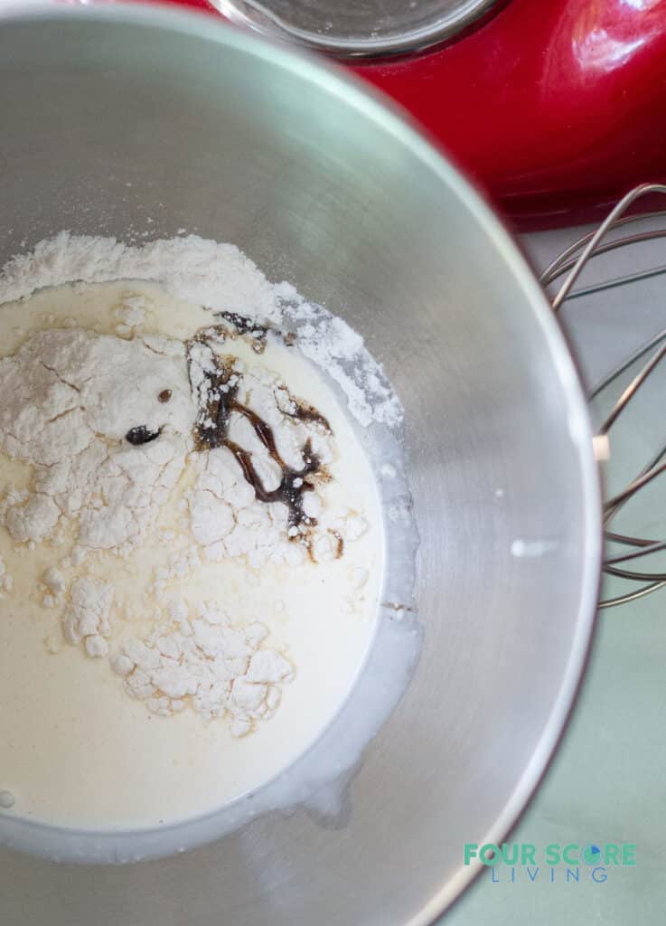 whipped cream, sweetener and vanilla in a bowl