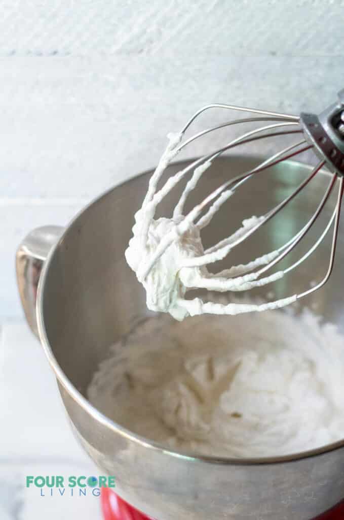 keto whipped cream on a whisk attachment