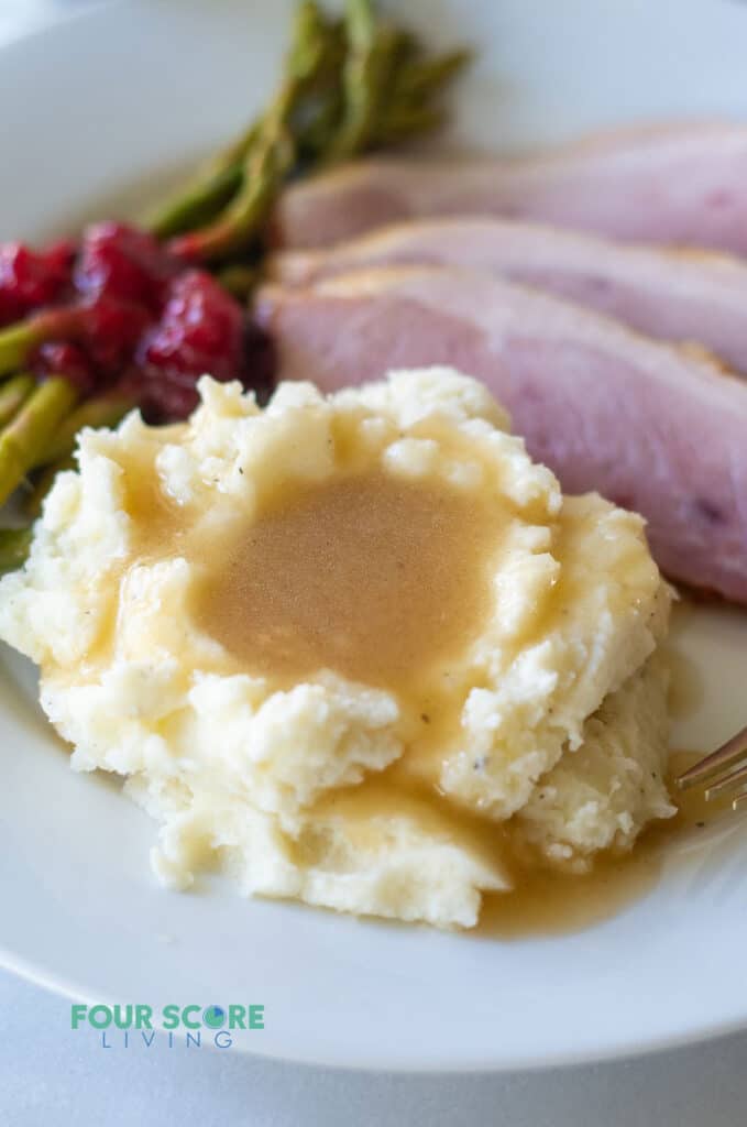 keto gravy over mashed cauliflower with ham