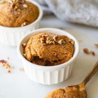 keto pumpkin mug cake with a bite out