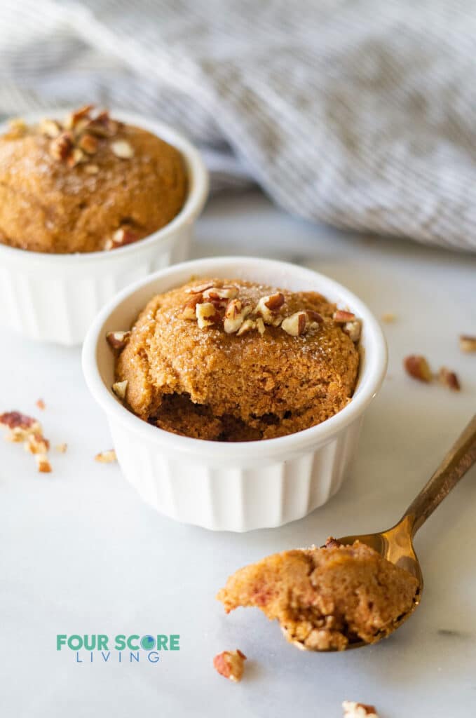 keto pumpkin mug cake with a bite out