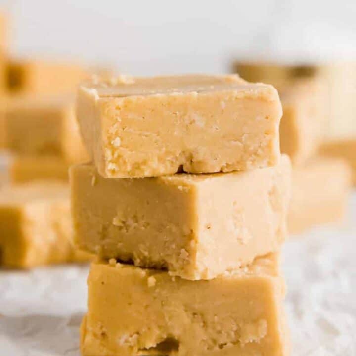three pieces of keto peanut butter fudge stacked