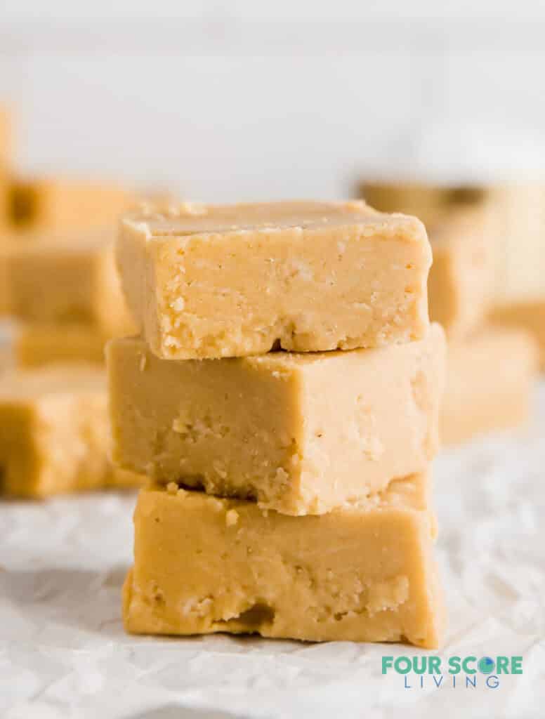 three pieces of keto peanut butter fudge stacked
