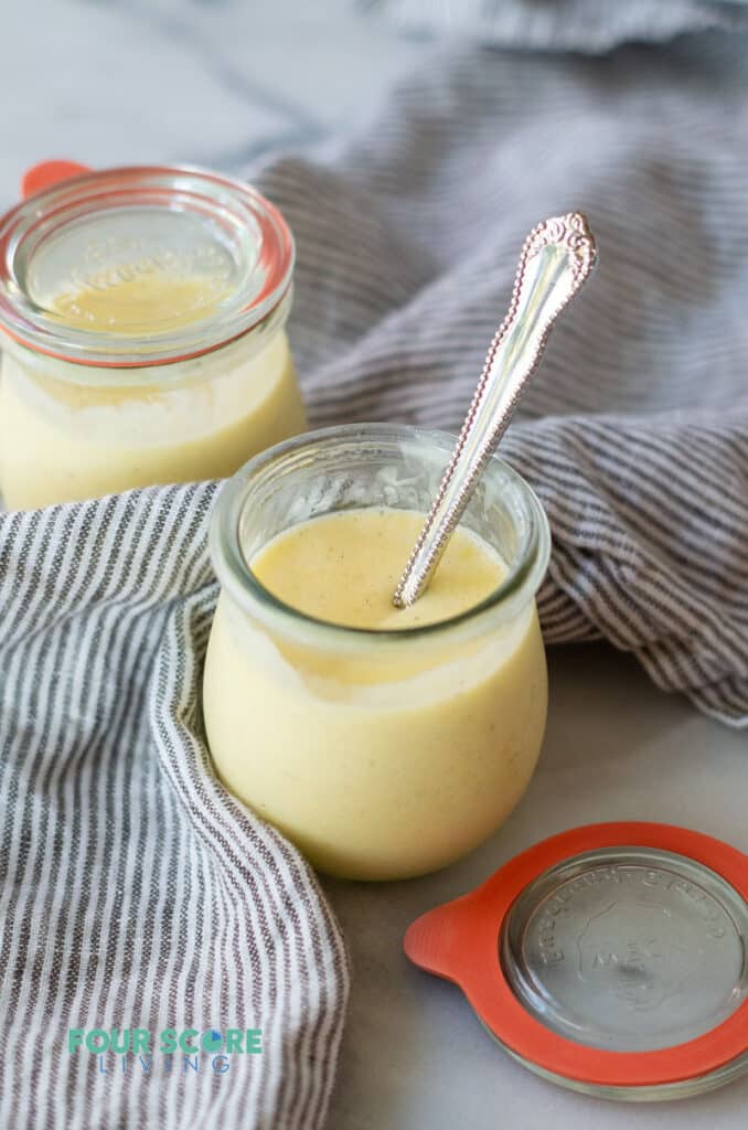keto pudding in a glass jar with a spoon