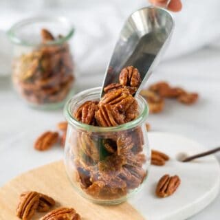 a scoop of keto candied pecans