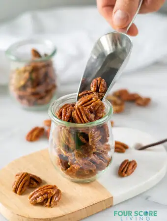 a scoop of keto candied pecans