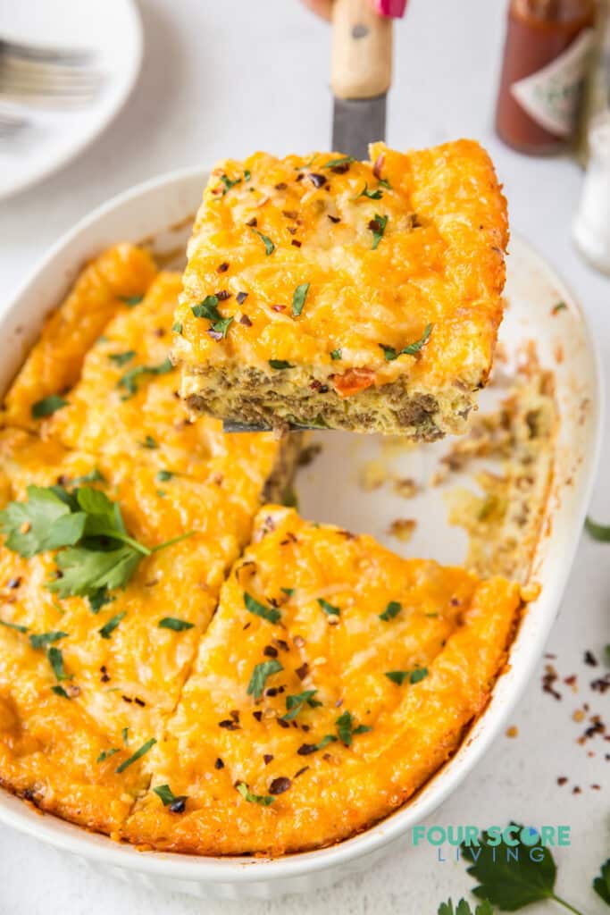 Keto breakfast casserole being served with a spatula.