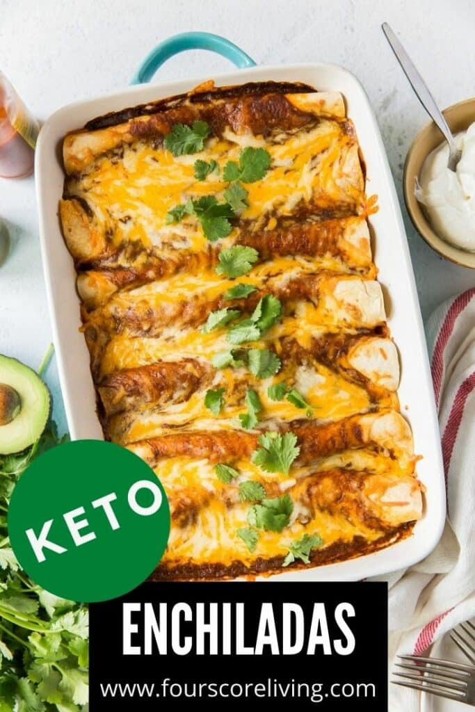 a full pan of enchiladas on a counter. Title on image reads, Keto Enchiladas.