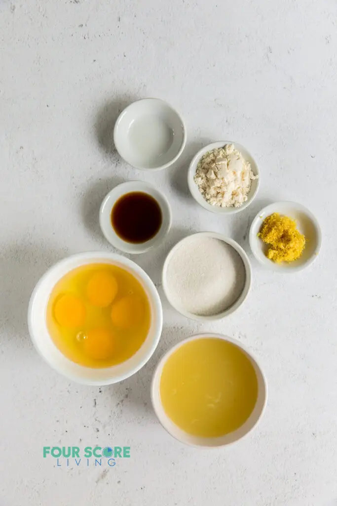 Top down view of ingredients needed for lemon bars in separate bowls.