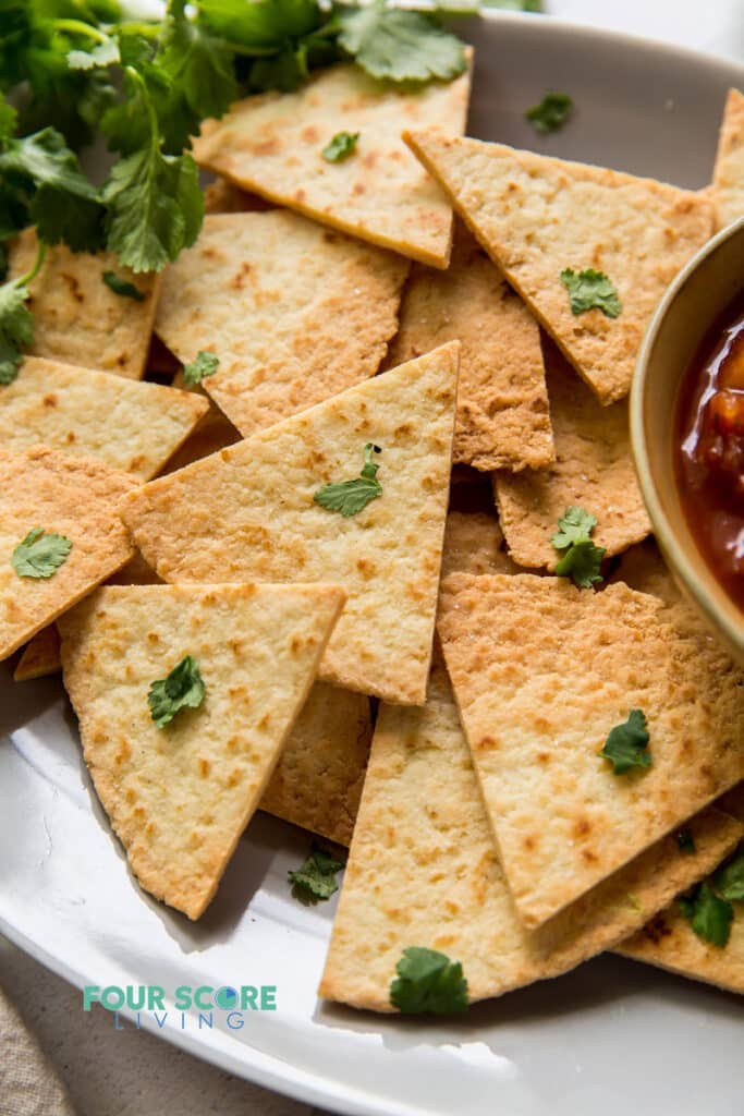 closeup view of keto tortilla chips on a plate.