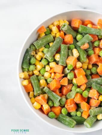 frozen mixed vegetables in a white bowl