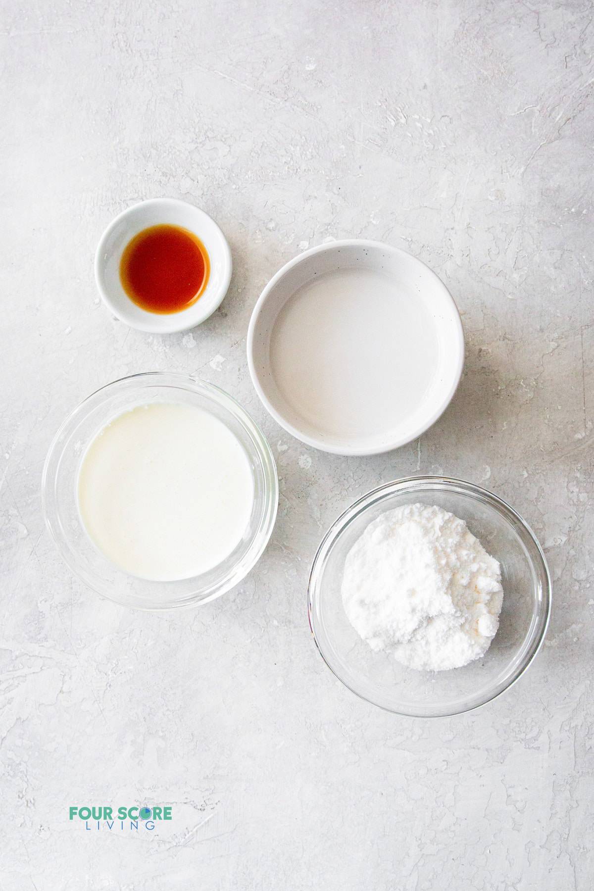 4 small white bowls with the ingredients for making keto coffee creamer