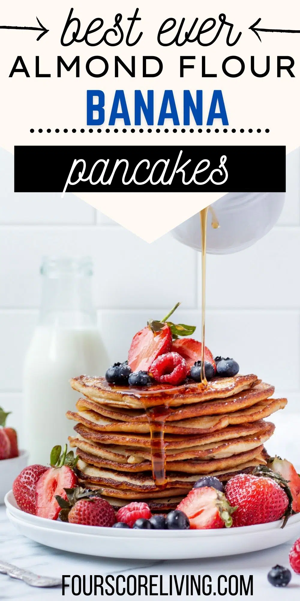 Image of a stack of pancakes garnished with fresh berries. Text overlay says Best ever Almond Flour Banana Pancakes