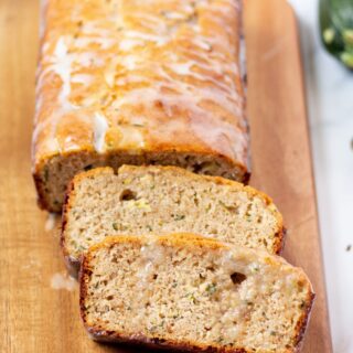 keto zucchini bread sliced on a cutting board