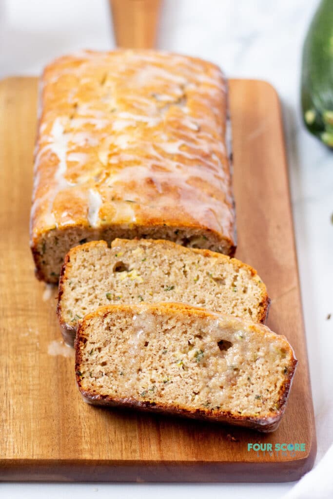 keto zucchini bread sliced on a cutting board