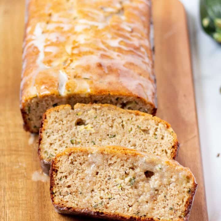 keto zucchini bread sliced on a cutting board