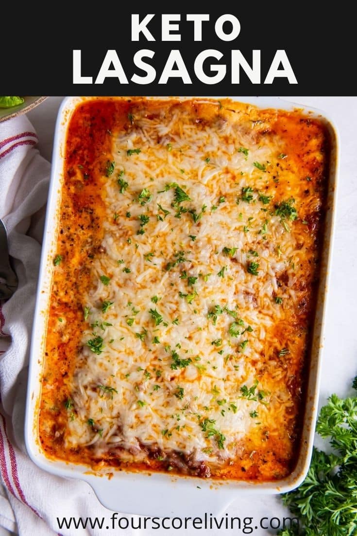 a large casserole of keto lasagna. White letters in a black box at the top of the image say Keto Lasagna