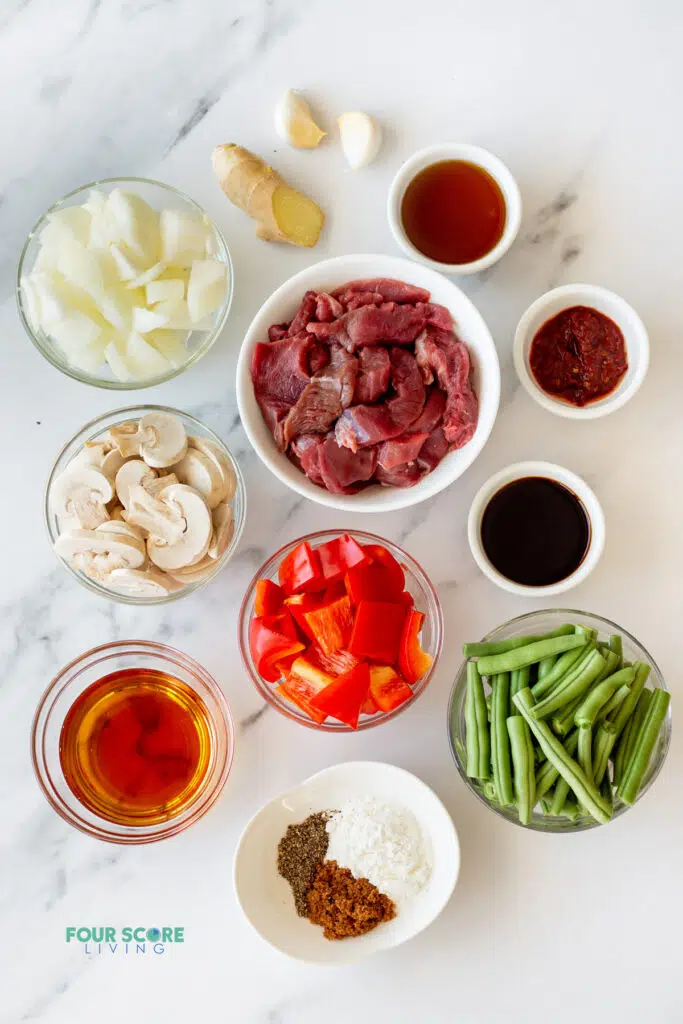 ingredients for black pepper angus steak in separate bowls