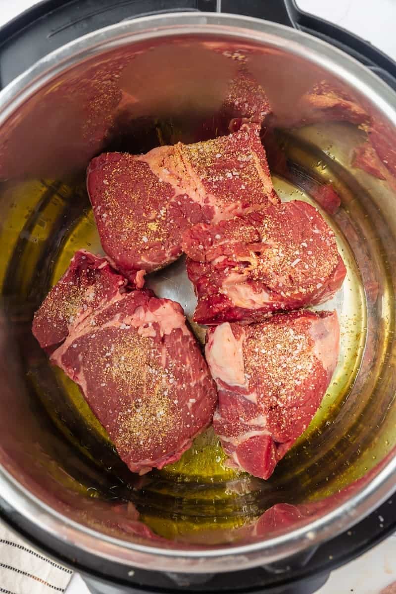 raw roast in a instant pot with seasonings