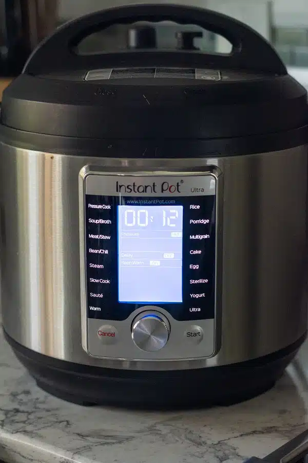 Photo of an Instant Pot, with 12 minutes on the timer.