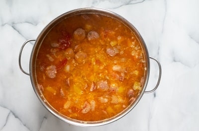 Top view photo of all the ingredients for Keto Gumbo in a stockpot, ready to serve.