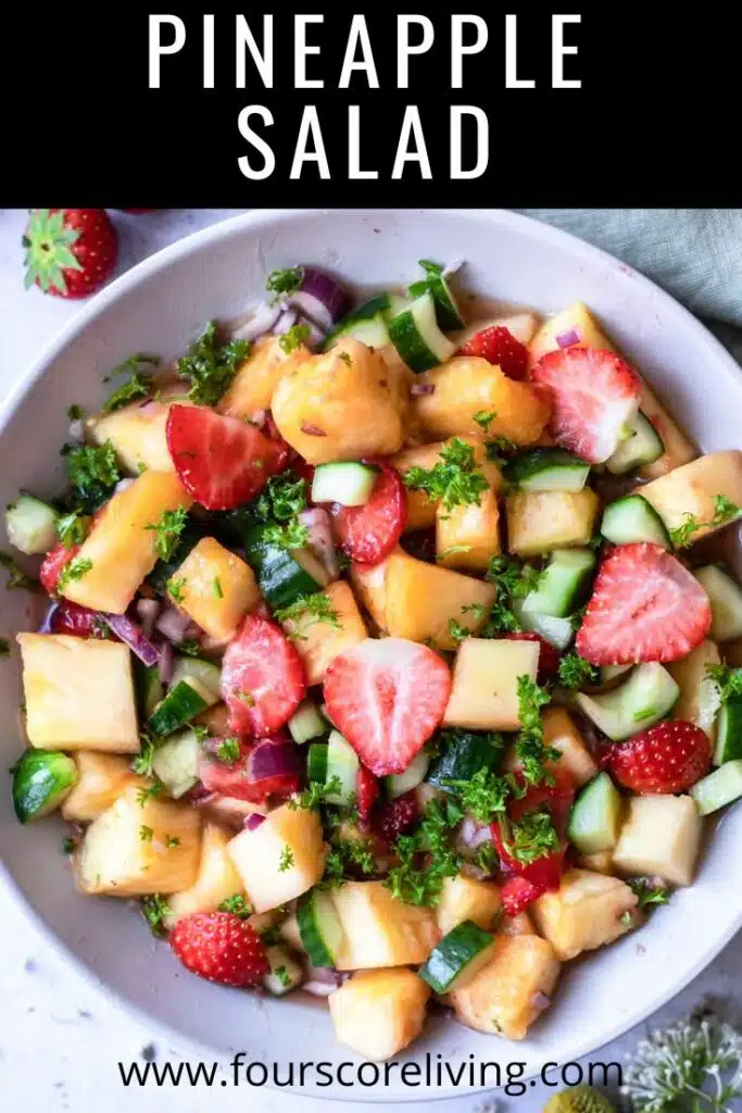 pinterest photo of pineapple salad in a white bowl