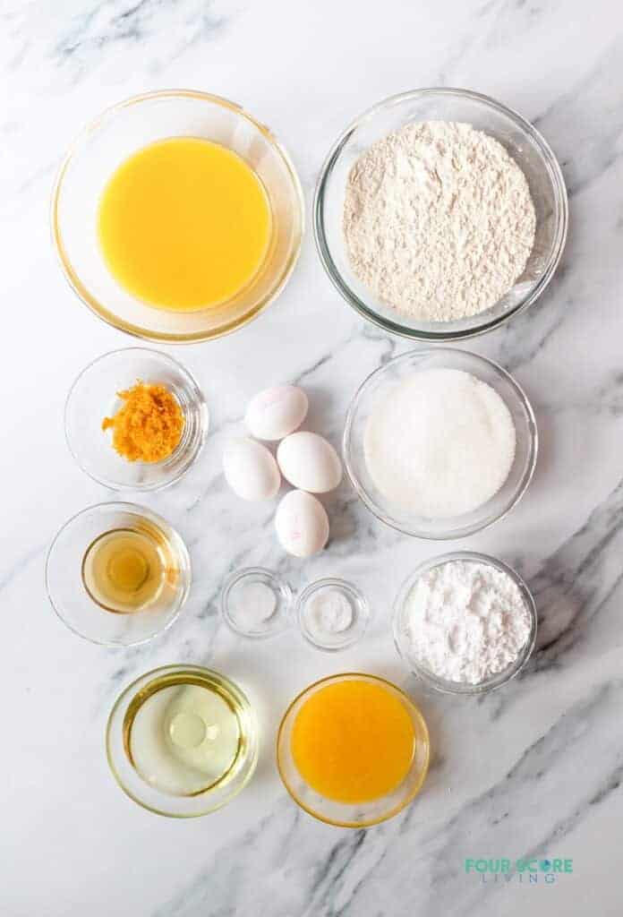 Top view photo of all the ingredients to make Italian Hangover Cake in separate bowls.