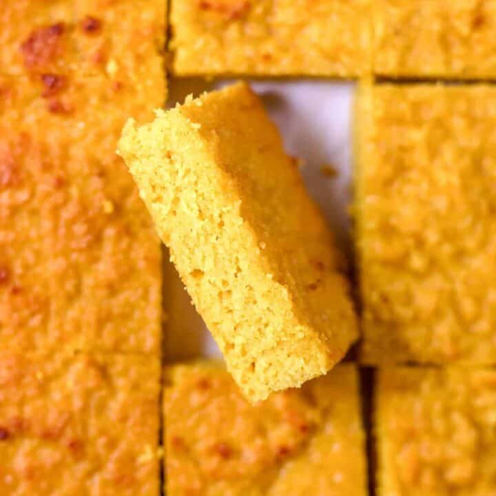 a slice of keto cornbread turned on its side to show the texture