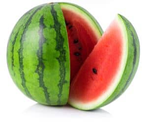 whole watermelon with a slice partially removed