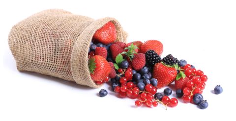 Burlap sac tipped over on a white background with a mix of berries, strawberries, blueberries, blackberries, spilling out.